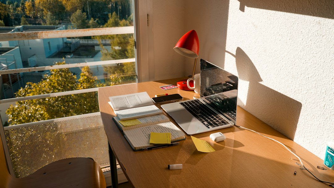 Bright workspace with laptop and office essentials